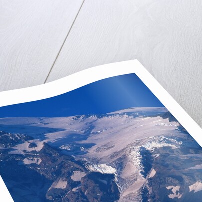 Snow Covered peak of Mount Rainier in the Cascade Mountain Range by Anonymous