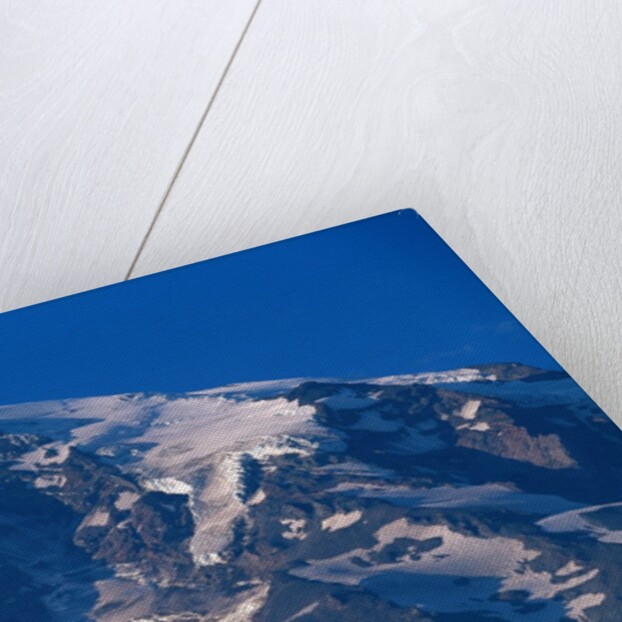 Snow Covered peak of Mount Rainier in the Cascade Mountain Range by Anonymous