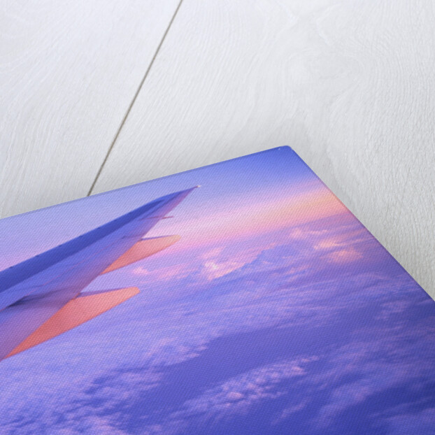 Setting Sun Hitting Airplane Wing by Anonymous