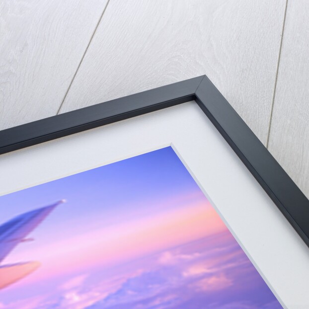 Setting Sun Hitting Airplane Wing by Anonymous