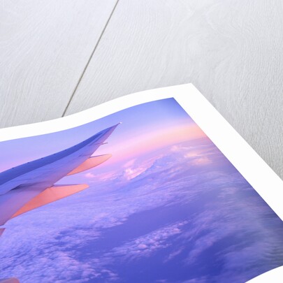 Setting Sun Hitting Airplane Wing by Anonymous