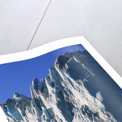 Ice Block Breaking off of Glacier by Anonymous