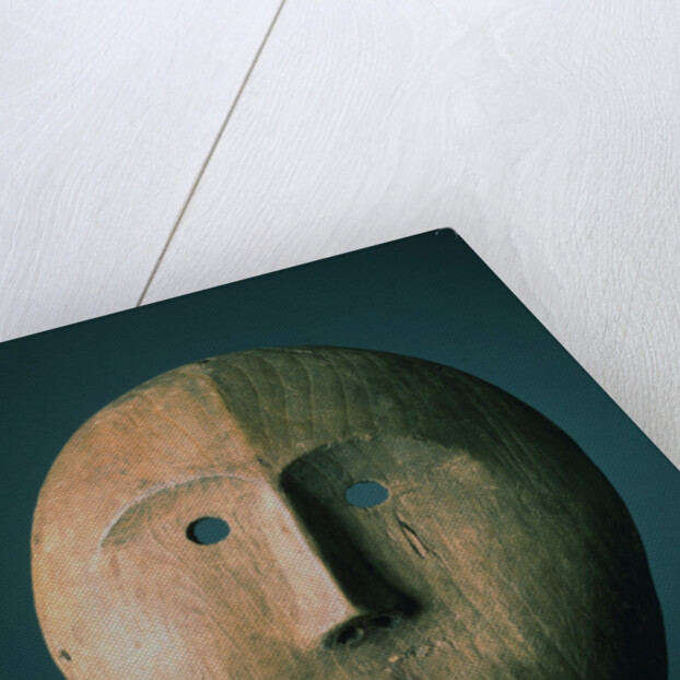 An Eskimo Wood Face Mask by Anonymous