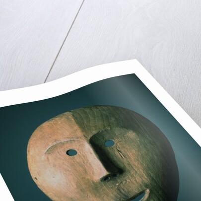 An Eskimo Wood Face Mask by Anonymous