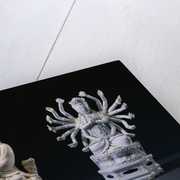 A Pair of Blanc-De-Chine Figures of Luohan and an Eighteen-Armed Guanyin by Anonymous