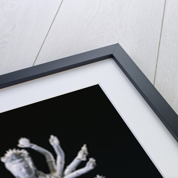 A Pair of Blanc-De-Chine Figures of Luohan and an Eighteen-Armed Guanyin by Anonymous