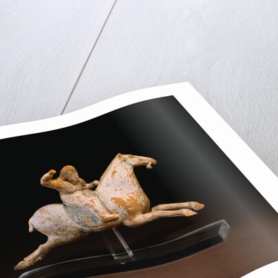 A Rare Painted Pottery Figure of a Female Polo Player by Anonymous