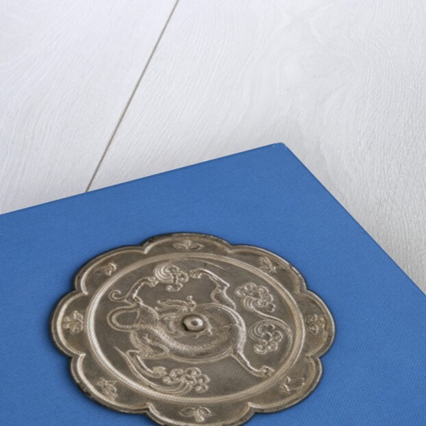 A Large Silvered Bronze Lobed Mirror. Tang Dynasty by Anonymous