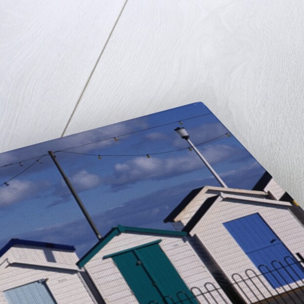 Beach Huts on Devon Town's Waterfront by Anonymous