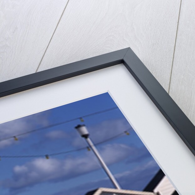 Beach Huts on Devon Town's Waterfront by Anonymous
