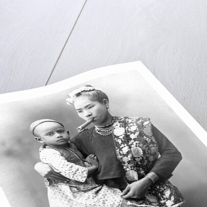 Burmese Woman Smoking Cigar by Anonymous