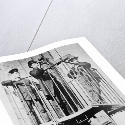 Men Atop Exhibition's Electric Elevator by Anonymous