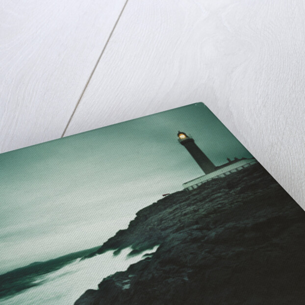 Lighthouse Beacon During a Storm by Anonymous