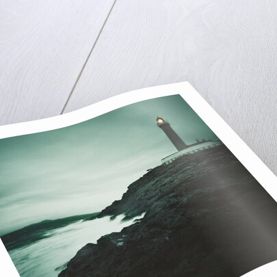 Lighthouse Beacon During a Storm by Anonymous