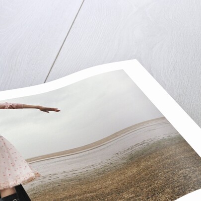 Woman Balancing on a Breakwater by Anonymous