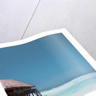 Beach Hut Over Shallow Water by Anonymous