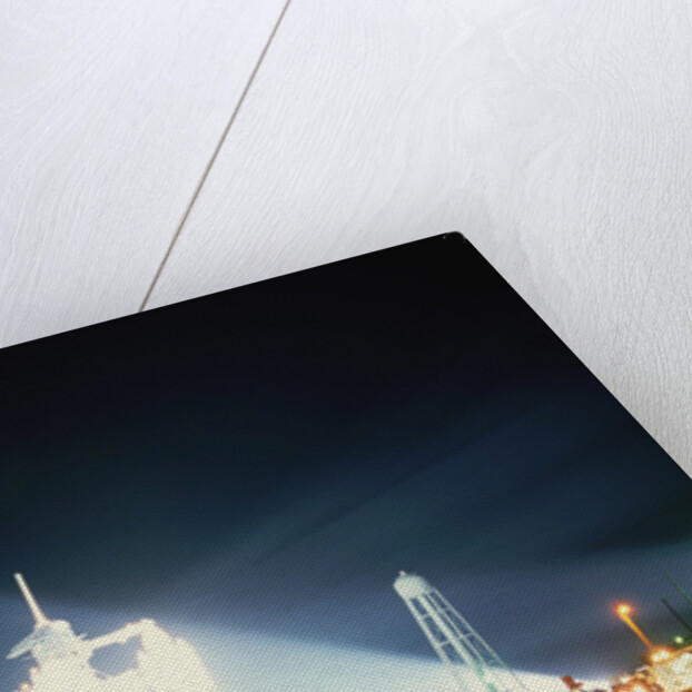 Space Shuttle Illuminated at Night by Anonymous