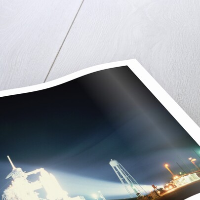 Space Shuttle Illuminated at Night by Anonymous