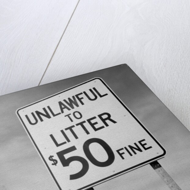 Unlawful to Litter Road Sign by Anonymous