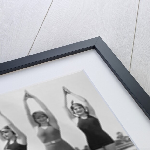 Women Holding up Their Arms in Diving Form by Anonymous