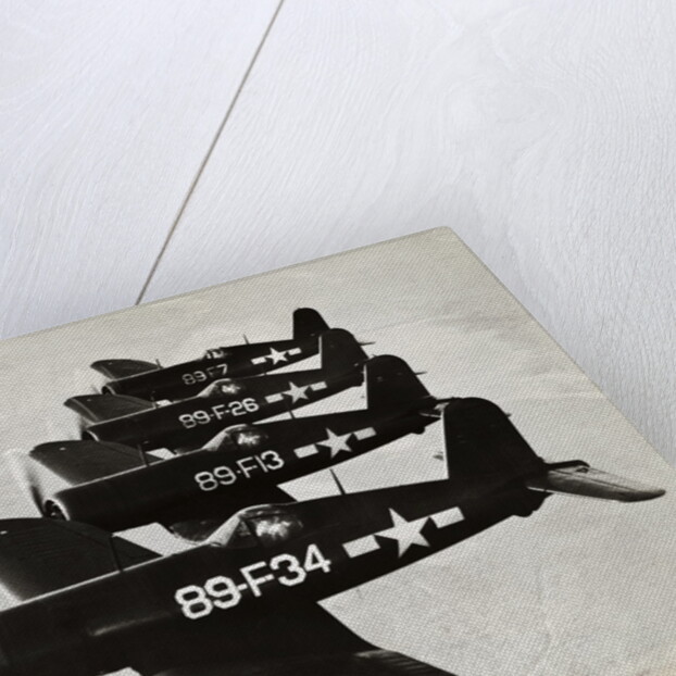 Four Navy Fighter Planes Flying in Formation by Anonymous