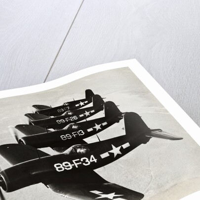 Four Navy Fighter Planes Flying in Formation by Anonymous