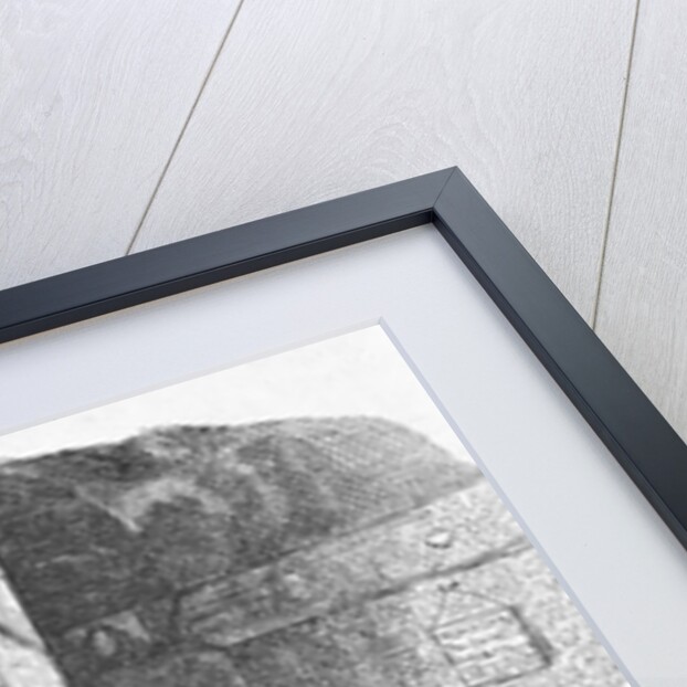 Man Sitting in Prison Cell by Anonymous