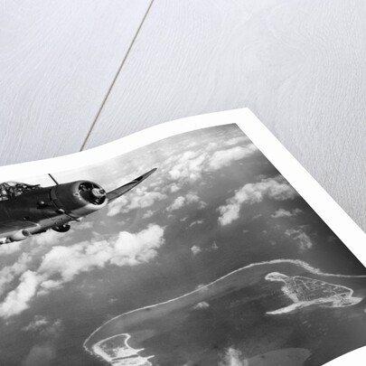 Fighter Plane Hovering Over Paific by Anonymous