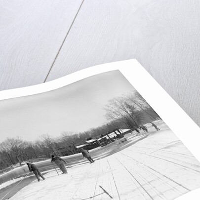 Men Gathering Ice from Frozen Pond by Anonymous