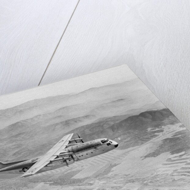 Airplane Flying Over Landscape by Anonymous