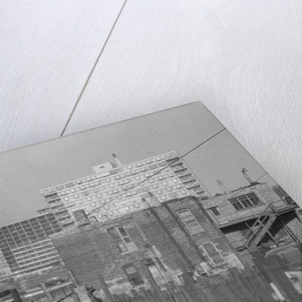 Modern Apartment Building Behind Slum Tenement in Chicago by Anonymous