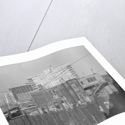 Modern Apartment Building Behind Slum Tenement in Chicago by Anonymous