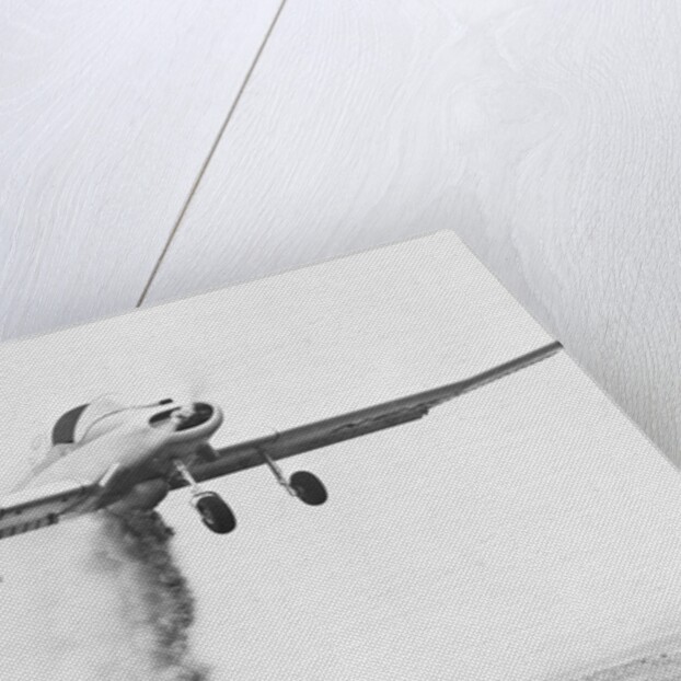 Crop Dusting Airplane in Flight by Anonymous