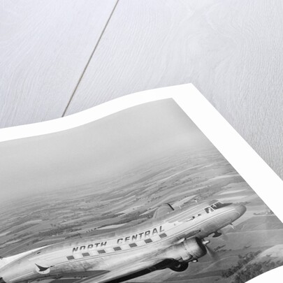 Douglas DC-3 Plane in Flight by Anonymous