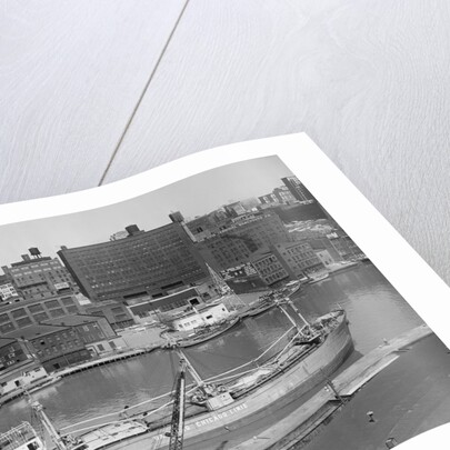 Cargo Ship Moving Down a River by Anonymous