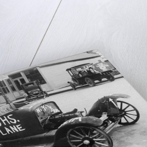 Early Model Car Parked at Station by Anonymous