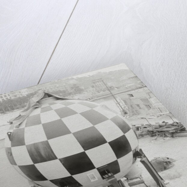 Checkered Steel Sphere Resting on Platform by Anonymous