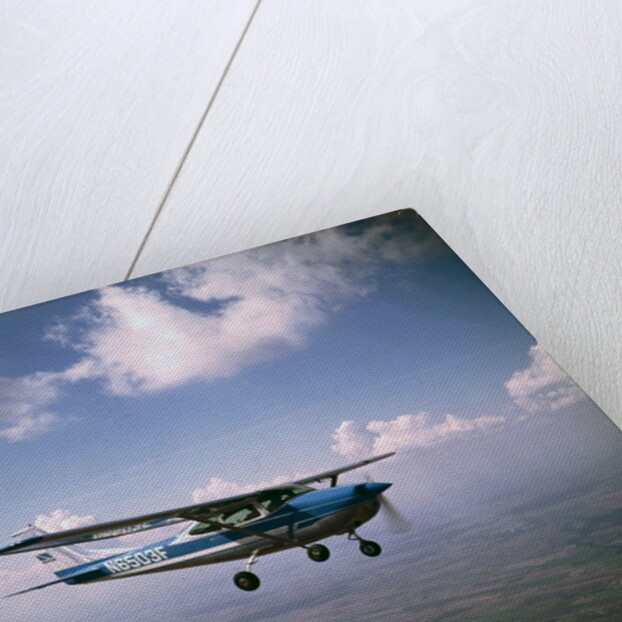 Cessna 182 Flying by Anonymous