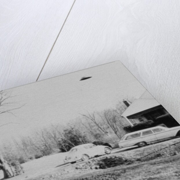 Unidentified Flying Object Flying Over House by Anonymous