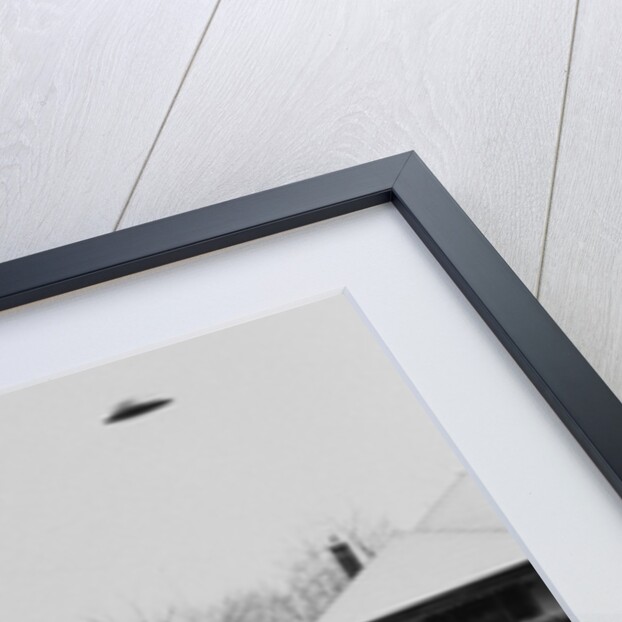 Unidentified Flying Object Flying Over House by Anonymous