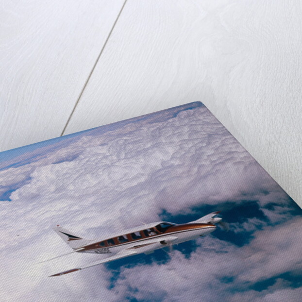 Navajo Piper Plane Flying by Anonymous