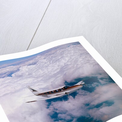 Navajo Piper Plane Flying by Anonymous