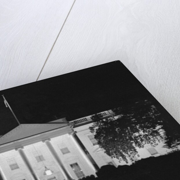 View of a Dimmed White House Building by Anonymous