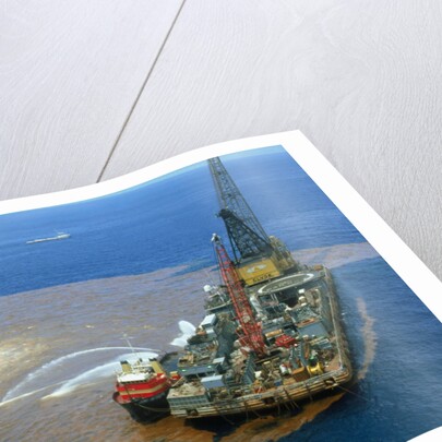 Manned Rig in Oil Spilled Waters by Anonymous