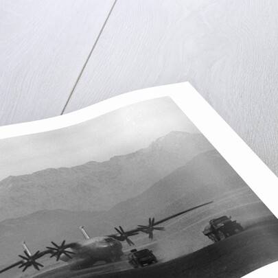 Russian Military Transport Plane on Runway by Anonymous