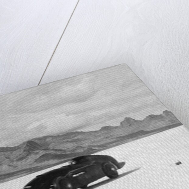 G.E.T. Eyston Breaking Speed Record in Automobile by Anonymous