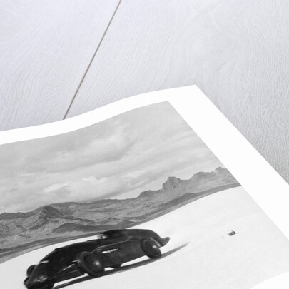 G.E.T. Eyston Breaking Speed Record in Automobile by Anonymous