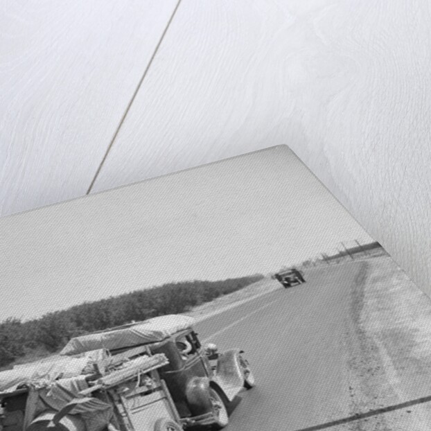 Truck Going down Highway by Anonymous