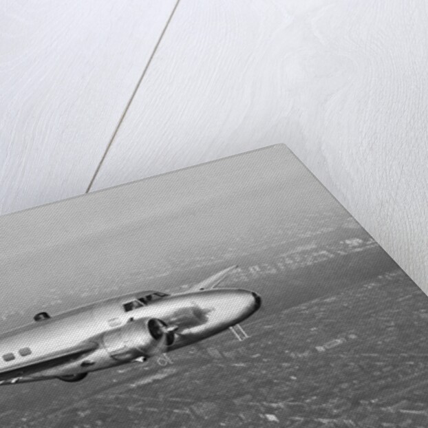 Howard Hughes' Lockheed 14 Super Electra over New York City by Anonymous