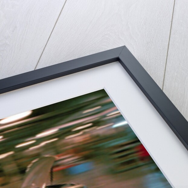 Partially Assembled Car Moving Through Work Station by Anonymous